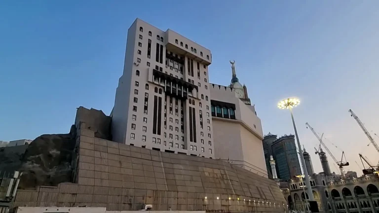 Jabal Abu Qubais in Makkah overlooking Masjid al-Haram during golden hour, sacred Islamic mountain where moon split and Black Stone was kept