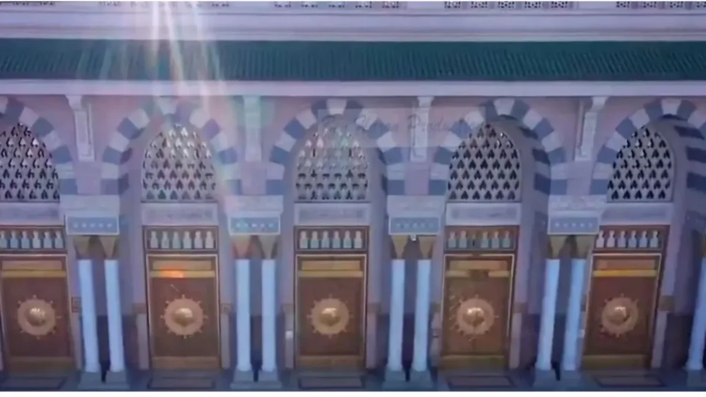 Golden doors of Medina Mosque showing Islamic architecture and entrance design of Prophet's Mosque gates in Saudi Arabia
