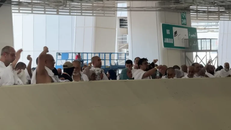 Pilgrims stoning Jamarat al-Aqabah at Jamarat Bridge in Mina during Hajj 2025