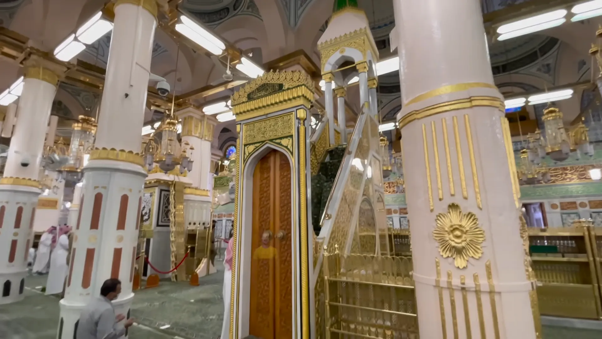 Interior of Rawdah with Quranic inscriptions and spiritual ambiance inside Masjid al-Nabawi
