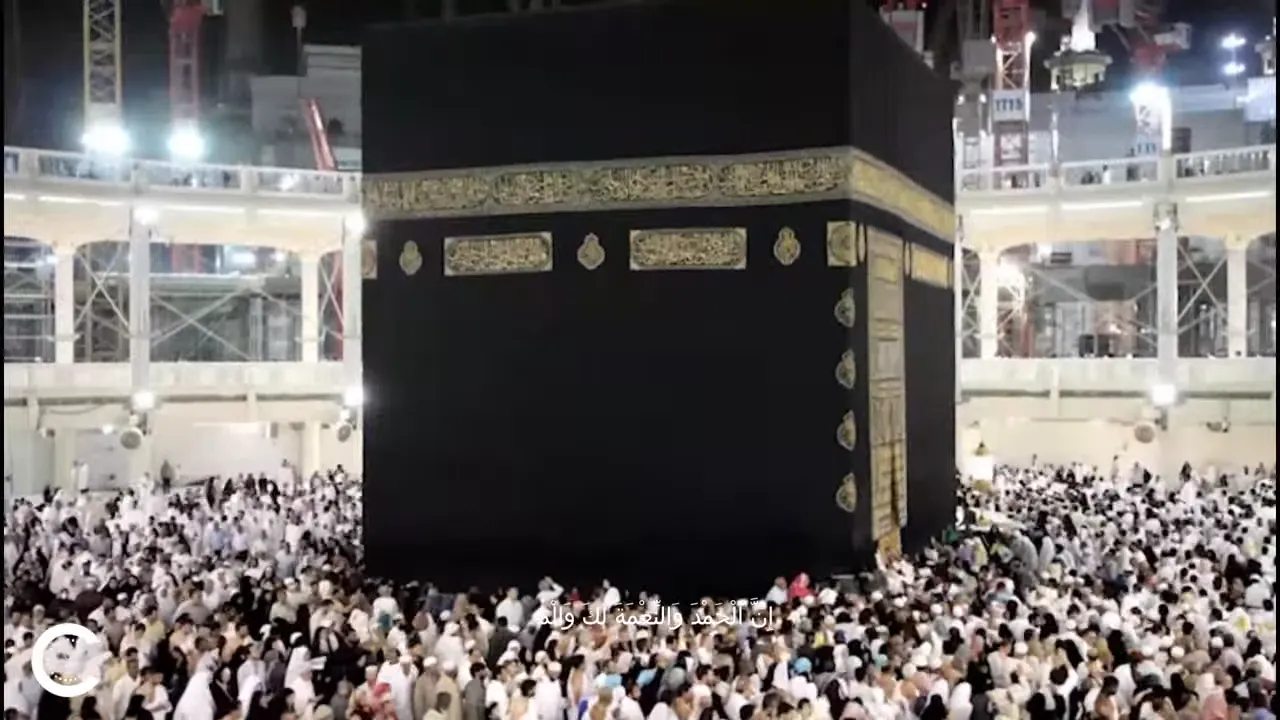 Tawaf al-Ziyarah at Kaaba during Hajj 2025 with pilgrim near Black Stone and crowd in motion